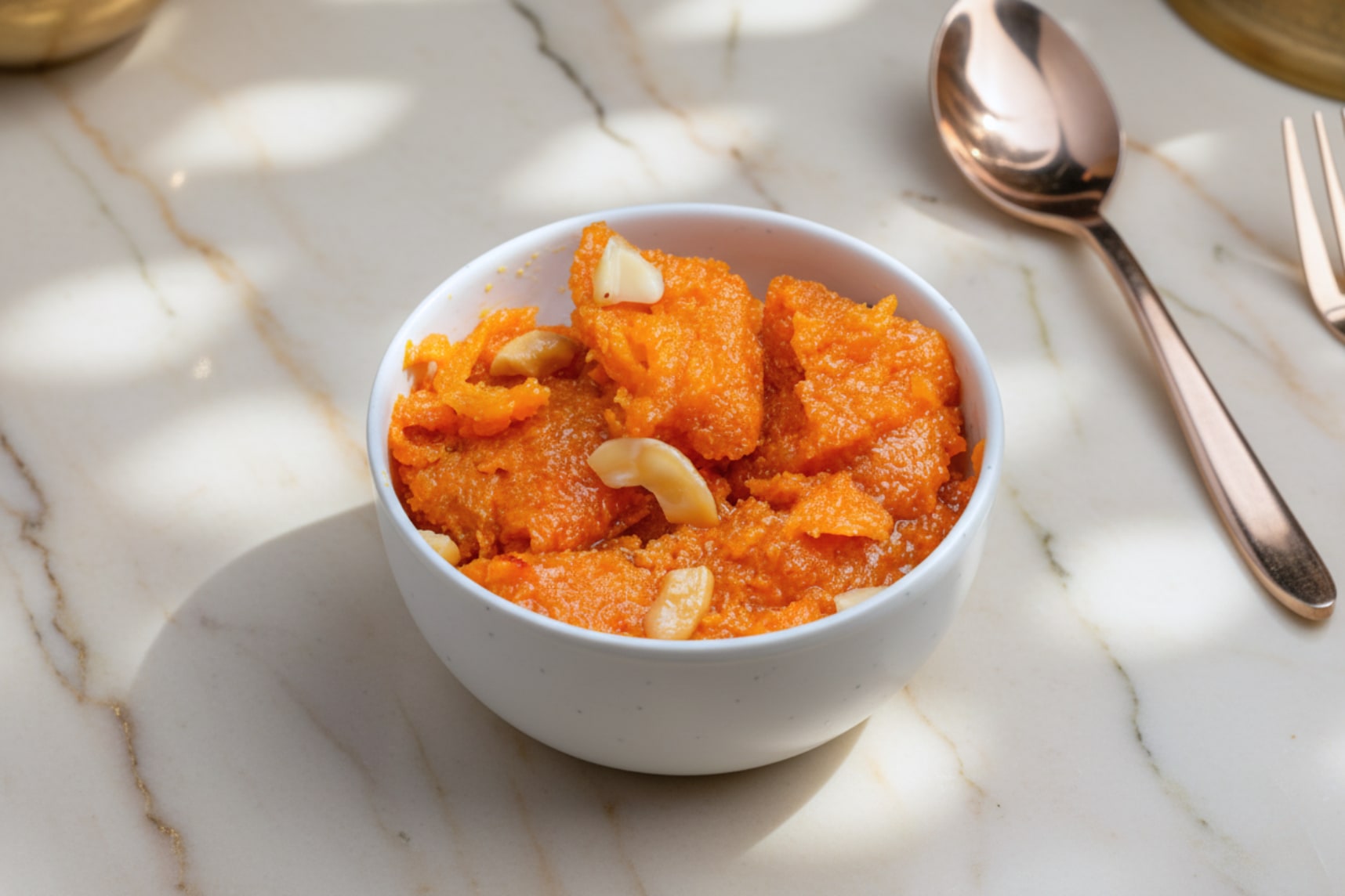Double ka meetha, the Hyderabadi bread pudding, in a bowl with nuts